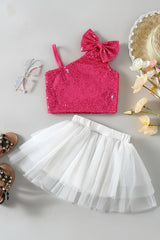 Pink sequin crop top with bow and white tulle skirt