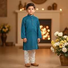 A boy's green kurta shalwar set