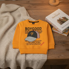 Orange sweatshirt with graphic design and text.