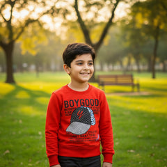 An orange sweatshirt with text and a hat pattern on it.