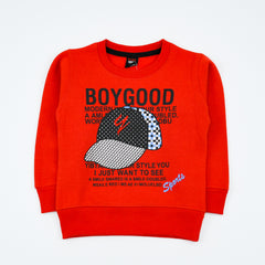 Red sweatshirt with graphic design and text.