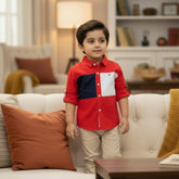 A red and white boys' dress shirt with a collar, buttons down the front, and a brand logo on the chest.