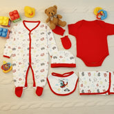 A 7-piece baby boy starter set including a round neck half sleeves body suit, a full sleeves closed feet romper, a wrapping sheet, a bib, a cap, and mittens, all with transportation-related prints.