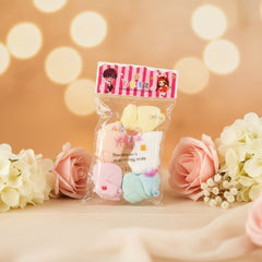 Packaged toy with decorative elements on a wooden surface