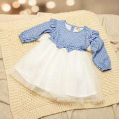 Blue polka dot dress with a white tulle skirt.