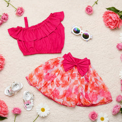 Pink top and floral skirt