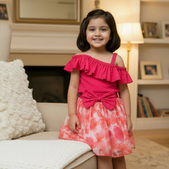 Pink top and floral skirt