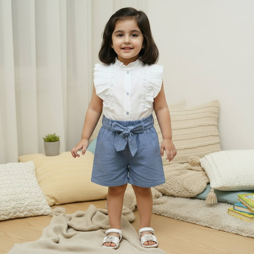 Children's outfit with blue shorts, white shirt