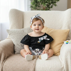 Black top, floral shorts