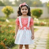Children's clothing set with pink top, floral dress and headband