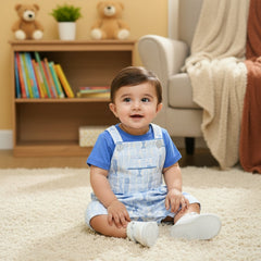 Blue t-shirt, patterned overalls