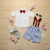Children's outfit with white shirt, red bow tie, suspenders, shorts