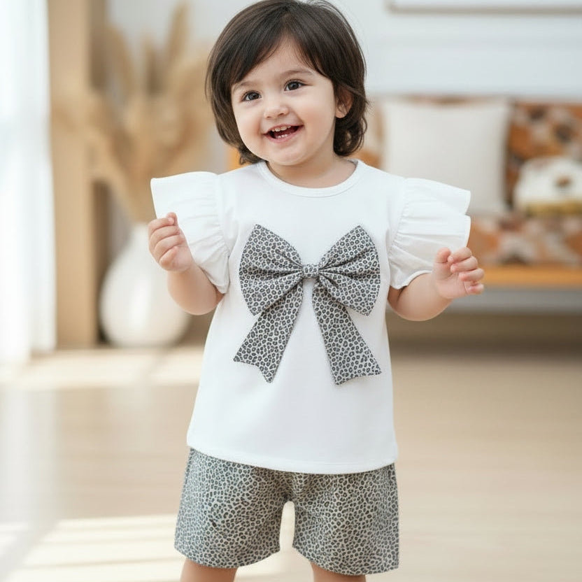 Children's outfit with white shirt with bow, gray shorts