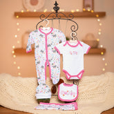 A set of baby girl clothing displayed on a rack, including a romper, body suit, bib, cap, and a wrapping sheet, all with a butterfly pattern on a white base.