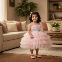 A sleeveless, knee-length red mesh frock with a white bow at the front.
