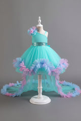 Colorful dress on a mannequin against a gray background