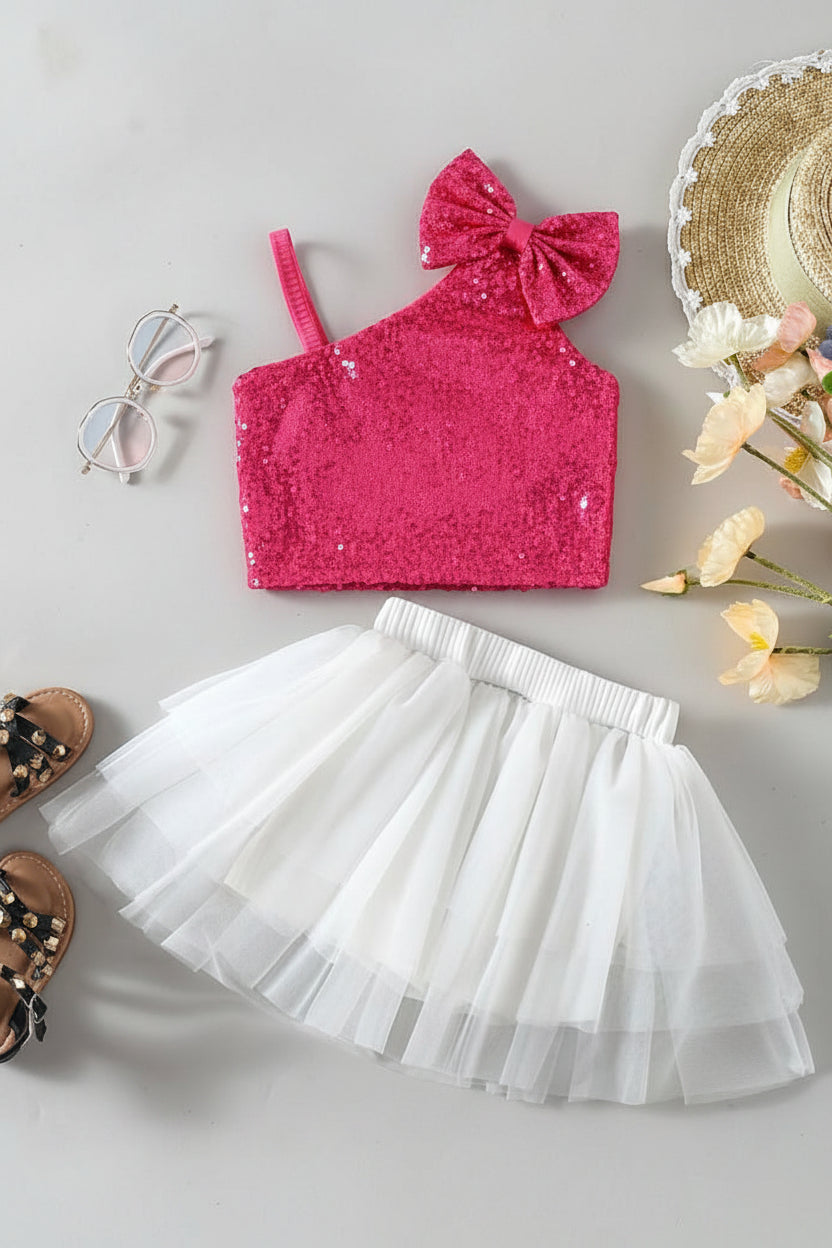 Pink sequin crop top with bow and white tulle skirt 