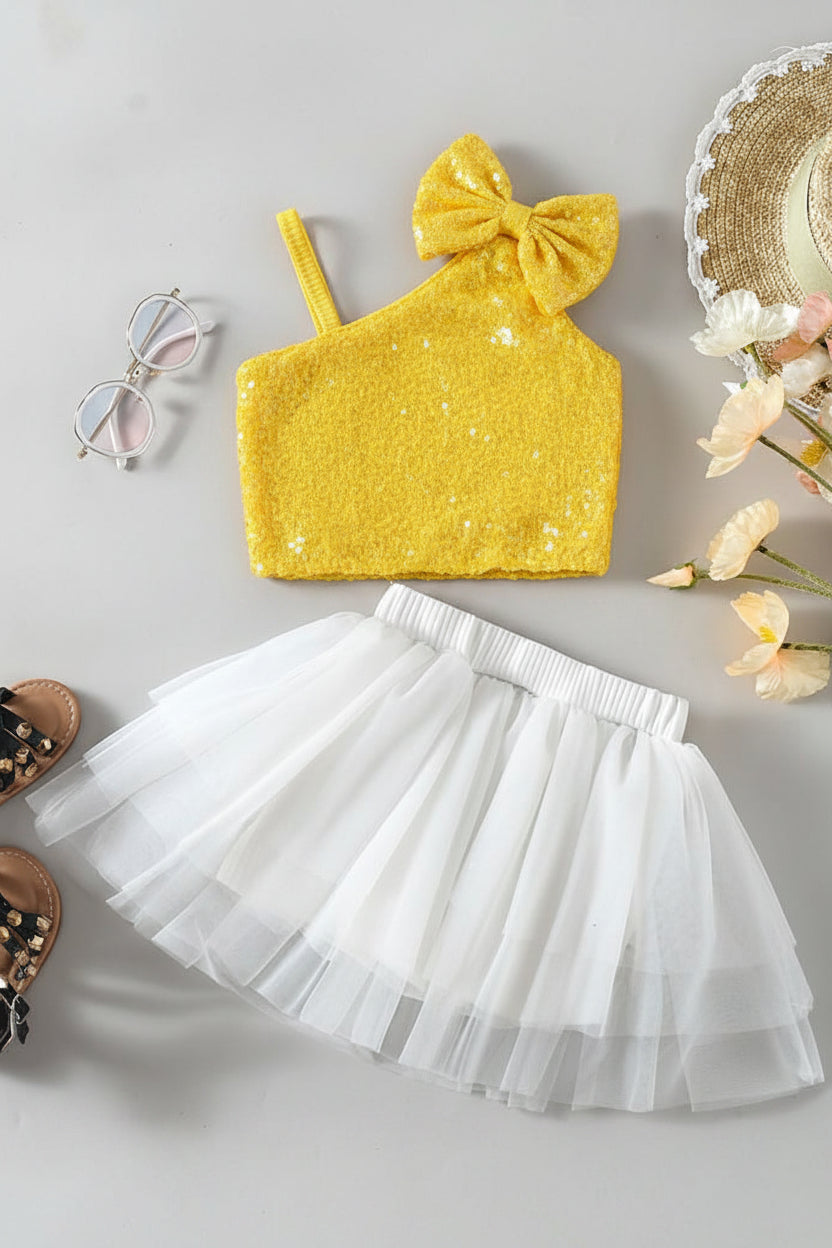 Yellow sequin crop top with bow and white tulle skirt