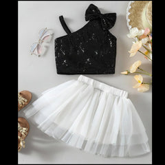 Black sequin crop top with bow and white tulle skirt 