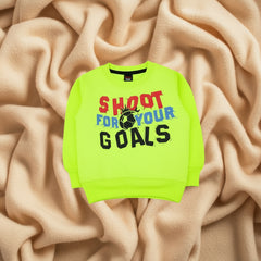 Neon green sweatshirt with colorful text and soccer graphic. 