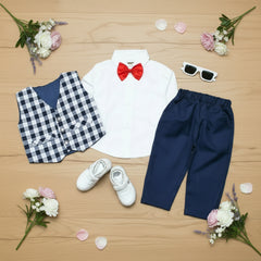 Children's outfit with white shirt, navy pants, checkered vest.