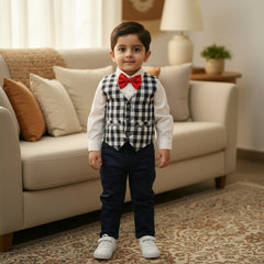 Children's outfit with white shirt, navy pants, checkered vest.