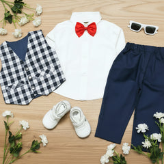 Children's outfit with white shirt, red bow tie, checkered vest, navy pants.