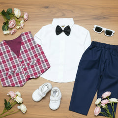 White shirt with black bow tie, plaid vest, navy pants