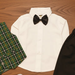White shirt with black bow tie, green plaid waistcoat.