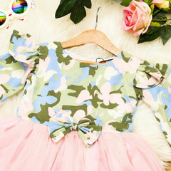 Floral-patterned dress with pink skirt.