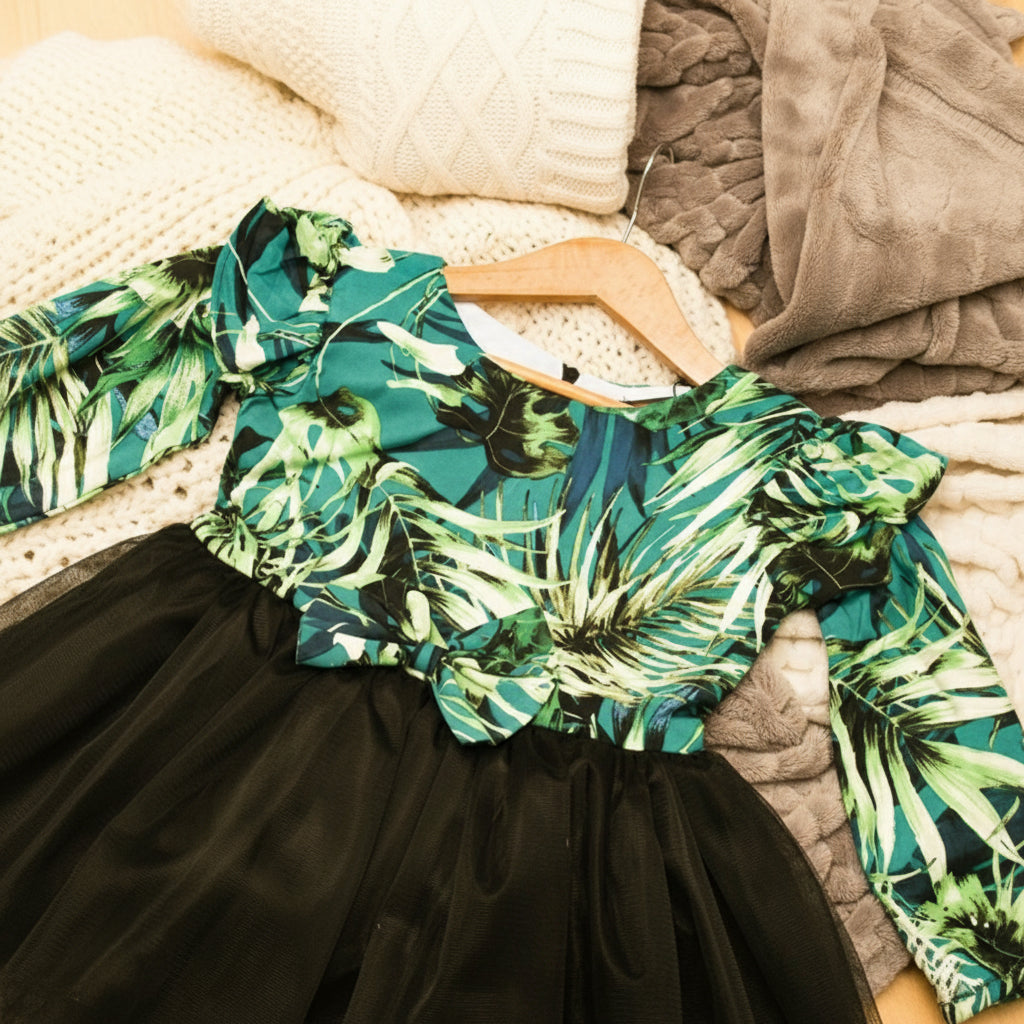 Green leaf-patterned top and black skirt 