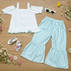 Children's outfit with top and pants.