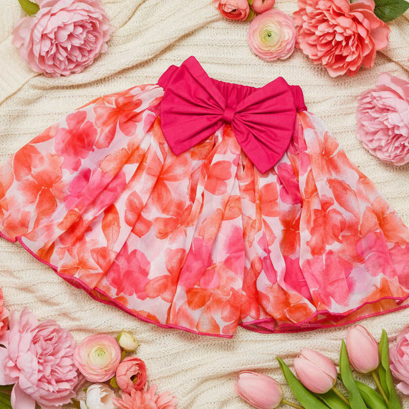 Pink floral skirt with a large bow