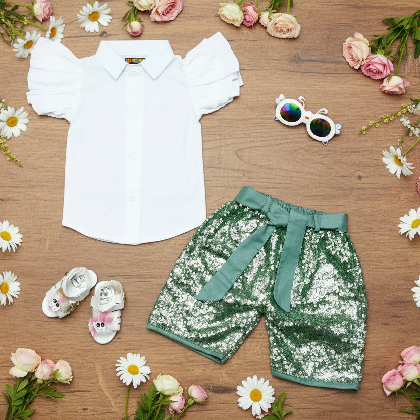 White shirt, green sequin shorts