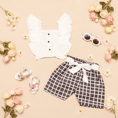 Children's outfit with shirt and shorts.