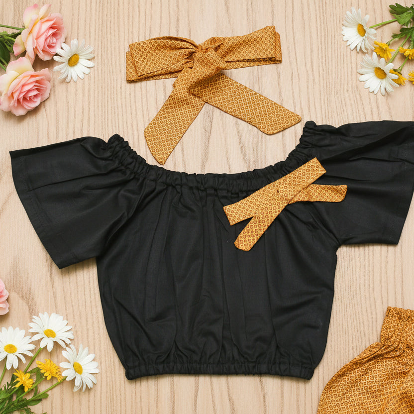 Black blouse with yellow bow