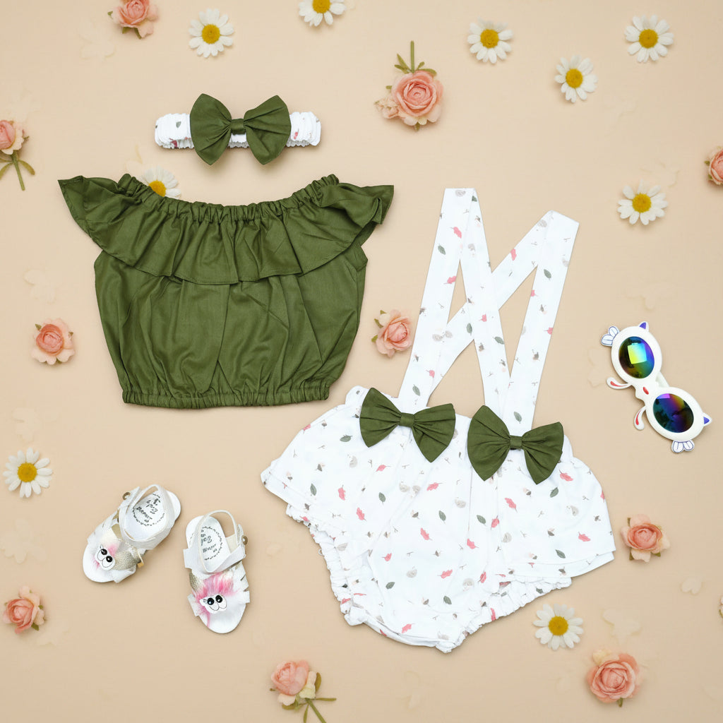 Children's outfit with green top, white romper with suspenders
