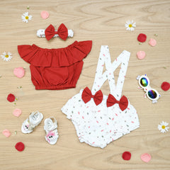 Children's outfit set with red top, white dress with bows