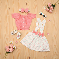 Children's clothing set with pink top, floral dress and headband