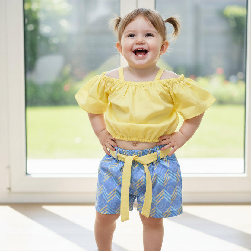 Yellow crop top, blue patterned shorts