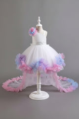 Colorful dress on a mannequin against a gray background