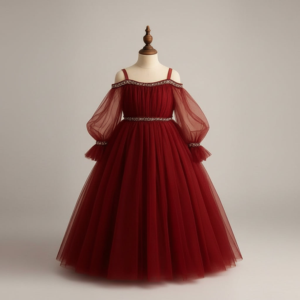 Red evening gown on a mannequin against a beige background